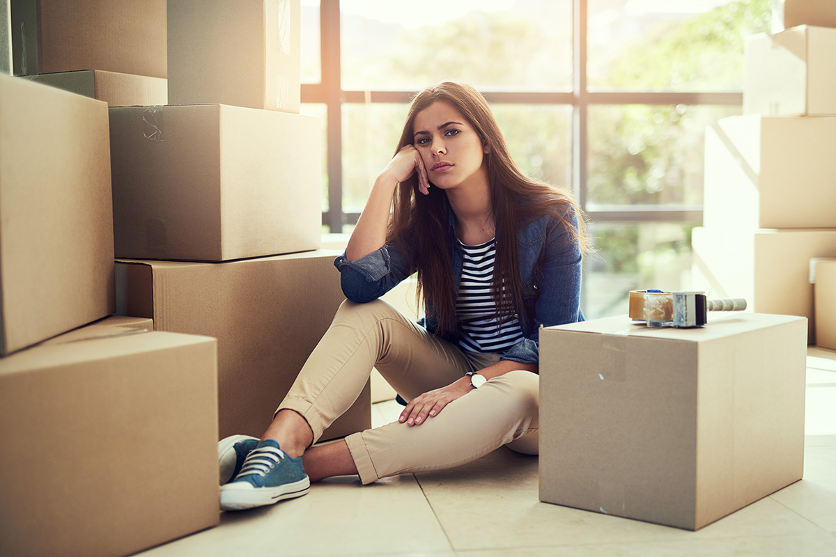 Girl Moving Boxes Disappointed